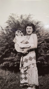 Archival photo of a proud mother holding her child